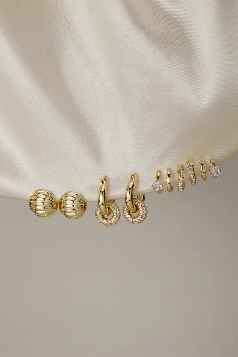 Gold necklace flatlay