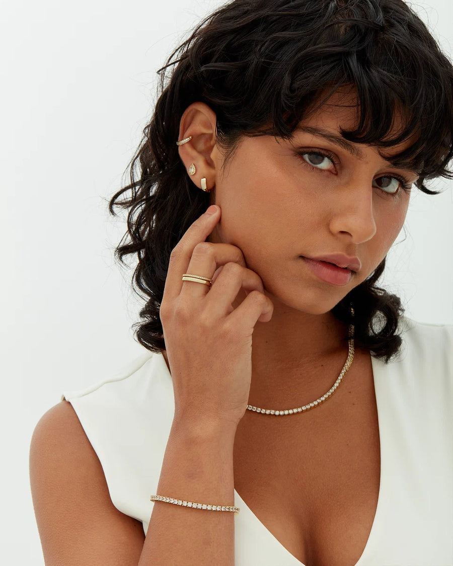 Yellow Gold Elin Tennis Bracelet — styled with earrings and a fine chain