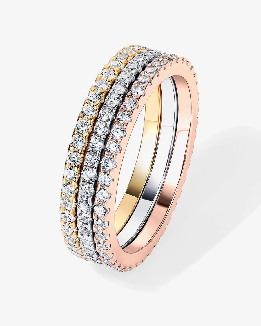 Vera Eternity Band — yellow, white and rose finishes stacked together