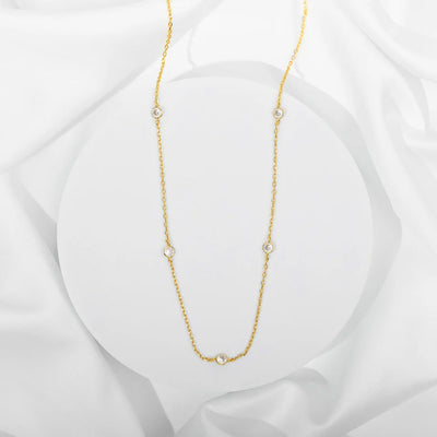 Yellow Gold Lieve Station Necklace — full necklace with five bezel-set cubic zirconia stations