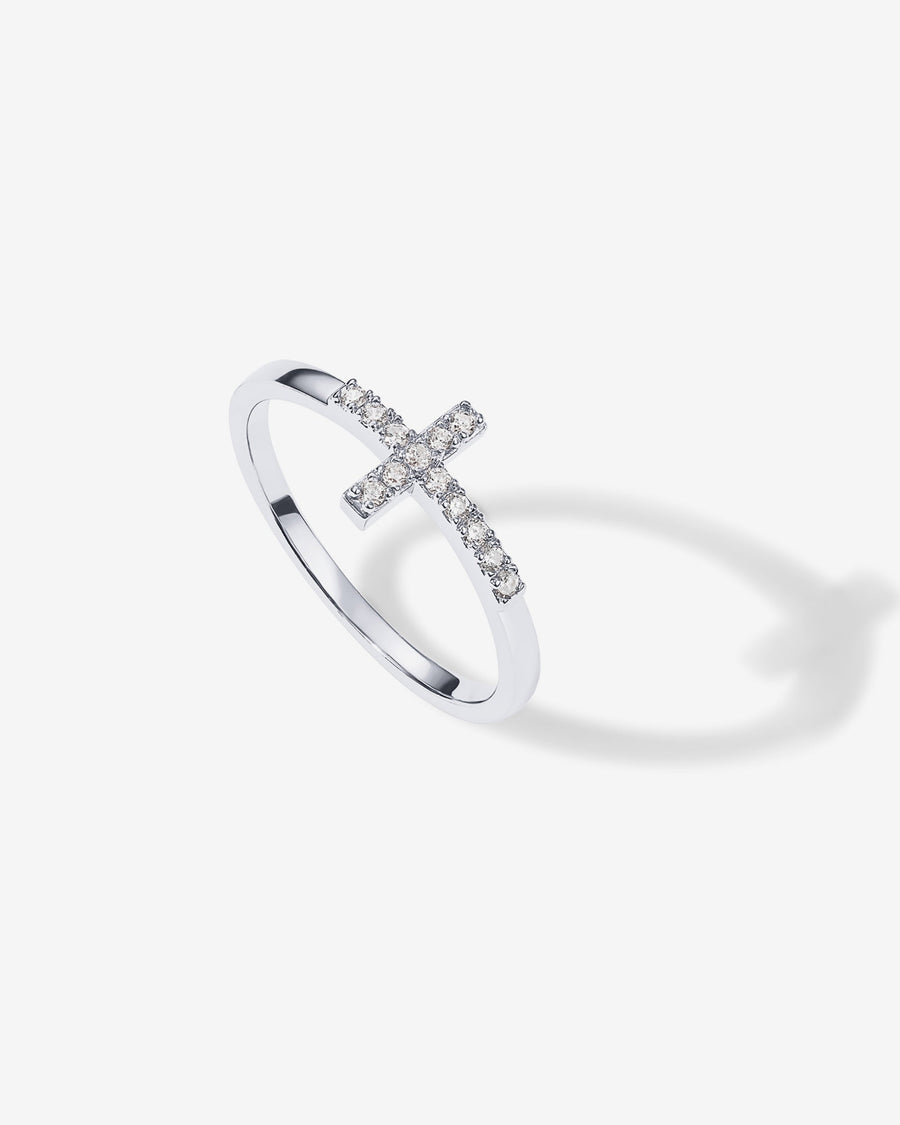 White Gold Roos Cross Ring — rhodium plated sideways cross ring with cubic zirconia
